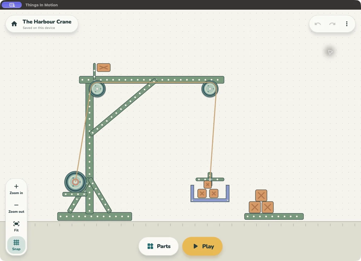 The Harbour Crane in Things In Motion, with a rope passing over pulleys to lift a basket of wooden crates
