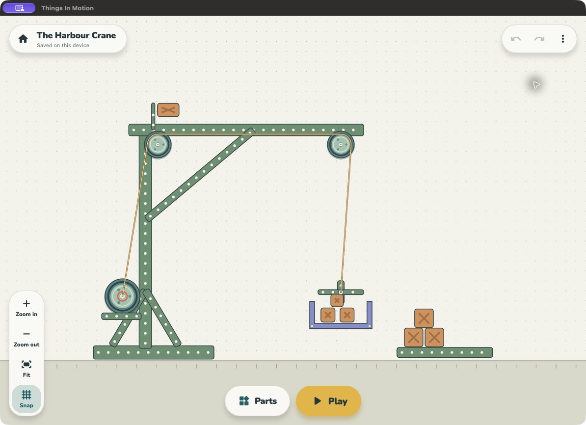 The Harbour Crane in Things In Motion, with a rope passing over pulleys to lift a basket of wooden crates