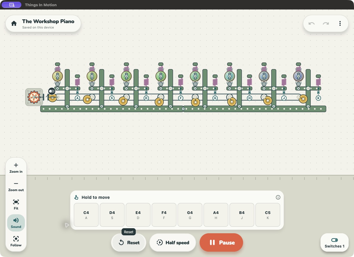The Workshop Piano running in Things In Motion, with eight mechanical keys, springs, bells and on-screen controls